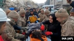 Turkish army commandos rescue Kübra, a ten-year-old girl, from under the rubble in Hatay, southern Turkey, Feb. 8, 2023. 