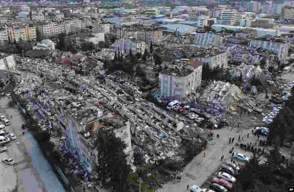Aerial photo shows the destruction in Hatay city center, southern Turkey.&nbsp;Search teams and emergency aid from around the world poured into Turkey and Syria as rescuers working in freezing temperatures dug &mdash; sometimes with their bare hands &mdash; through the remains of buildings flattened by a magnitude 7.8 earthquake.&nbsp;