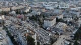 Aerial photo shows the destruction in Hatay city center, southern Turkey, Feb. 7, 2023. (IHA via AP)