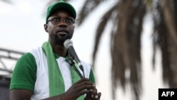 FILE - Opponent Ousmane Sonko, mayor of Ziguinchor, speaks during a rally of the Senegalese opposition at Place de l'Obelisque in Dakar, June 8, 2022.