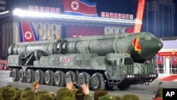 This photo provided by the North Korean government shows what it says an intercontinental ballistic missile during a military parade to mark the 75th founding anniversary of the Korean People’s Army in Pyongyang, North Korea, Feb. 8, 2023.