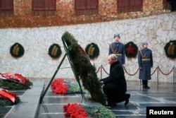 Russian President Vladimir Putin attends a wreath-laying ceremony during an event marking the 80th anniversary of the Battle of Stalingrad in World War II, in Volgograd, Russia, Feb. 2, 2023. (Sputnik/Dmitry Lobakin/Pool via Reuters)
