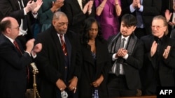 Rodney Wells (2nd L) and RowVaughn Wells (3rd L), parents of Tyre Nichols, are applauded after US President Joe Biden acknowledged them during the State of the Union address in the House Chamber of the US Capitol in Washington, DC, on Feb. 7, 2023.