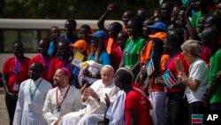 Pope Francis meets with a group of the Catholic faithful from the town of Rumbek, who had walked for more than a week to reach the capital, after he addressed clergy at the St. Theresa Cathedral in Juba, South Sudan, Feb. 4, 2023.