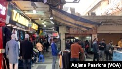 A market in market in Gurugram near New Delhi. India, which has a huge youth population, can emerge as a huge market and be a labor resource. 