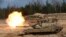 U.S. Army M1A1 Abrams tank fires during NATO enhanced Forward Presence battle group military exercise Crystal Arrow 2021 in Adazi, Latvia March 26, 2021 REUTERS/Ints Kalnins/File Photo