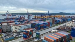 FILE - A general view shows the port in Vladivostok, Russia, Sept. 5, 2022. Trade experts have said the U.S. is working to deprive Russia's military of advanced equipment by threatening to enact secondary sanctions on businesses that still trade with Russia.