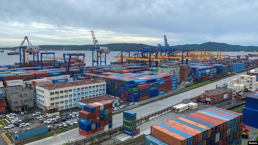 FILE - A general view shows the port in Vladivostok, Russia, Sept. 5, 2022. After nearly a year of heavy sanctions, the Russian economy has rebounded as importers found new avenues of trade to bring products into the country.