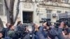 Journalists gather in front of the Iranian Embassy in Baku, Azerbaijan, Jan. 27, 2023.