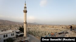 (FILE) A cemetery in Douma in the eastern suburbs of Damascus, Syria 