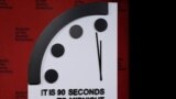 FILE - The 'Doomsday Clock' is moved to 90 seconds to midnight - closer than ever before to the threat of annihilation, at the National Press Club in Washington, Jan. 24, 2023.
