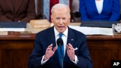 FILE - President Joe Biden delivers his first State of the Union address to a joint session of Congress at the Capitol, March 1, 2022, in Washington. Tuesday's address is at 9 p.m. EST (0200 GMT) in Washington.