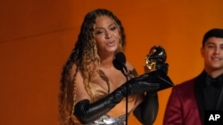 Beyonce accepts the award for best dance/electronic music album for "Renaissance" at the 65th annual Grammy Awards on Sunday, February 5, 2023, in Los Angeles. (AP Photo/Chris Pizzello)