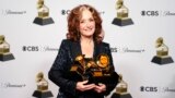 Bonnie Raitt, winner of the awards for Best Song of the Year, Best American Roots Song and Best Americana Performance poses in the press room at the 65th annual Grammy Awards, Feb. 5, 2023, in Los Angeles.