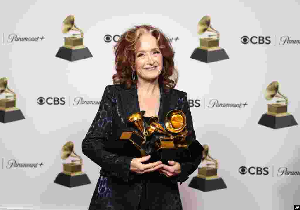 Bonnie Raitt, winner of the awards for Best Song of the Year, Best American Roots Song for &quot;Just Like That&quot; and Best Americana Performance of &quot;Made up My Mind,&quot; poses in the press room at the 65th annual Grammy Awards, Feb. 5, 2023, in Los Angeles, California.