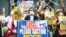 FILE - Myanmar activists call for the U.S. to sanction Myanmar's state-run Myanma Oil and Gas Enterprise ahead of U.S. President Joe Biden's visit to Japan, in Tokyo, May 22, 2022. The U.S. imposed new sanctions on Myanmar on Jan. 31, 2023, including targeting MOGE officials.