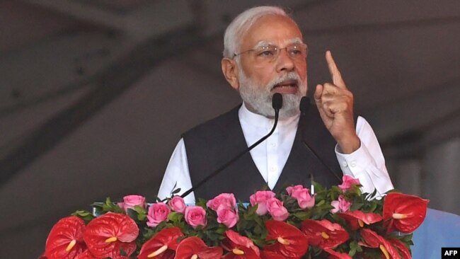 India's Prime Minister Narendra Modi speaks during a rally in Mumbai on Jan. 19, 2023.