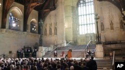 Ukrainian President Volodymyr Zelenskyy addresses parliamentarians in Westminster Hall, London, during his first visit to the UK since the Russian invasion of Ukraine, Feb. 8, 2023.