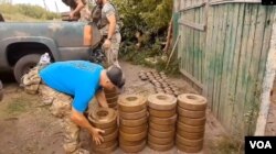 Screen shot of VOA report on US Green Beret Veteran Clears Mines in Ukraine