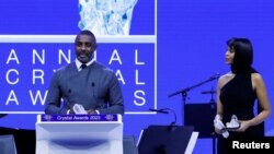 fILE: British actor Idris Elba delivers a speech as he and his wife Sabrina Dhowre Elba, United Nations International Fund for Agricultural Development (IFAD) Goodwill Ambassador, appear ahead of the World Economic Forum (WEF), in Davos, Switzerland, January 16, 2023. 