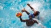 FILE - Two teams play water polo during an Awatu Winton Water Polo Club competition at the University of Ghana in Accra, Ghana, Saturday, Jan. 14, 2023