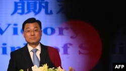 FILE - China's Xie Feng speaks at a press conference in Hong Kong, Feb. 7, 2020.