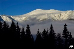 FILE - The summit of New Hampshire's Mount Washington, Jan. 30, 2023, file photo. Forecasters on top of Mount Washington said wind chill values dropped to 108 degrees below zero Friday night.