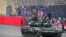 FILE: Russian service members drive a tank during a military parade marking the 80th anniversary of the victory of Red Army over Nazi Germany's troops in the Battle of Stalingrad during World War Two, in Volgograd, Russia, Feb. 2, 2023. 
