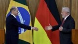 Канцлер Германии Олаф Шольц (слева) и президент Бразилии Луис Инасио да Силва (справа)
