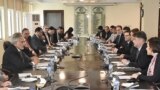 This handout photograph released by the Pakistan Press Information Department (PID) on Jan. 31, 2023, shows Pakistani and International Monetary Fund officials meeting at the Finance Ministry in Islamabad.