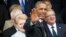 U.S. President Barack Obama, center, waves as he arrives for a group photo during a NATO summit at the Celtic Manor Resort in Newport, Wales, Sept. 4, 2014.