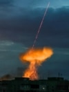 An explosion follows the downing of a Russian drone in Kherson, Ukraine, on July 26, 2024.