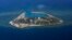 FILE - The Vietnamese-claimed Southwest Cay island in the Spratly island group is seen from a Philippine Air Force C-130 transport plane.
