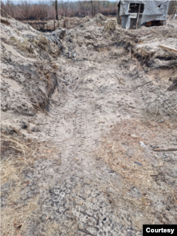 Tread marks from heavy vehicles can be seen in trenches that Ukraine says Russian troops dug in radioactive soil near the Chernobyl nuclear power plant after occupying it on Feb. 24, 2022. Photo taken on April 5, 2022. (Courtesy Evgen Kramarenko)