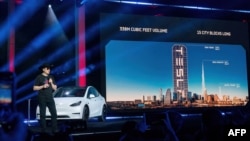 Tesla Motors CEO Elon Musk speaks at the company's Giga Texas manufacturing "Cyber Rodeo" grand opening party on April 7, 2022 in Austin, Texas. Tesla welcomed electric car lovers to Texas on April 7 for a huge party inaugurating its massive new factory. 