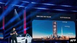 Tesla Motors CEO Elon Musk speaks at the company's Giga Texas manufacturing "Cyber Rodeo" grand opening party on April 7, 2022 in Austin, Texas. Tesla welcomed throngs of electric car lovers to Texas on April 7 for a huge party inaugurating its massive n