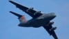 FILE - A Y-20 Chinese military transport plane is seen during an airshow in Zhuhai city, southern China, Nov. 7, 2018. Media and military experts said Sunday that six Chinese Y-20 planes landed in Belgrade Saturday, reportedly carrying surface-to-air miss