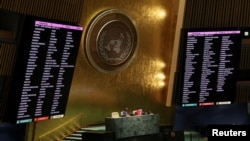 Displays show the list of countries taking part in voting on suspending Russia from the United Nations Human Rights Council during an emergency special session of the U.N. General Assembly at the United Nations headquarters in New York, April 7, 2022.