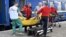 Ambulance workers and MSF medics transfer a patient from an evacuation train to an ambulance in the western Ukrainian city of Lviv, April 10, 2022.