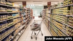 FILE: A trolley is photographed in an empty supermarket in Dakar on May 11, 2020. 