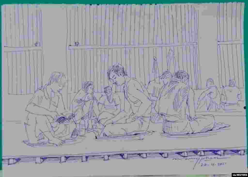 MYANMAR-POLITICS/PRISON -A smuggled sketch shows people inside of Myanmar&#39;s Insein prison with a written date April 17, 2021, in this undated picture obtained by REUTERS