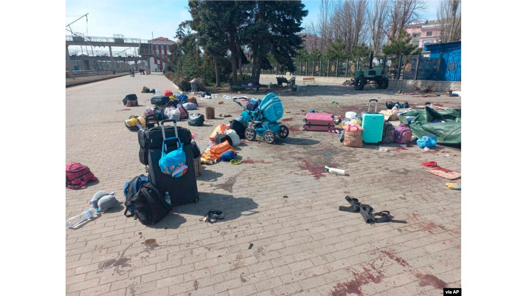 In this photo published on Ukrainian President Volodymyr Zelenskyy's Telegram channel, blood stains are seen among bags and a baby carriage on a platform after a missile struck a railway station in Kramatorsk, Ukraine, April 8, 2022.
