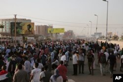 Sudanese protesters take part in a rally against military rule on the anniversary of previous popular uprisings, in Khartoum, Sudan, April 6, 2022.