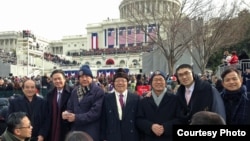 World War II D-Day invasion veterans Herman Zeitchik (L) and Antonio Gimenez (R) are surrounded by other veterans as they attend a ceremony at the National World War II Memorial on the 70th anniversary of the D-Day invasion of Europe, while in Washington, D.C.