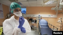 A nurse wearing a protective gears is seen at Lenval pediatric hospital in Nice, France, March 5, 2020.