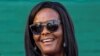 (FILES) This file photo taken on August 25, 2017 shows Zimbabwe's first lady Grace Mugabe attending the opening of the annual agricultural fair in the capital Harare. Zimbabwe's leading university has published the thesis submitted by former first lady Grace Mugabe, who was controversially awarded a doctorate which is now the subject of a fraud investigation. / AFP PHOTO / Jekesai NJIKIZANA