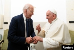 U.S. President Joe Biden and Pope Francis meet as they attend the G7 summit, in Savelletri, Italy, on June 14, 2024. (Vatican Media via Reuters)