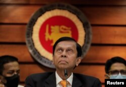 FILE - Sri Lanka's Central Bank Governor Ajith Nivard Cabraal looks up during a news conference in Colombo, Sri Lanka, March 4, 2022. Cabraal quit on April 4, 2022.