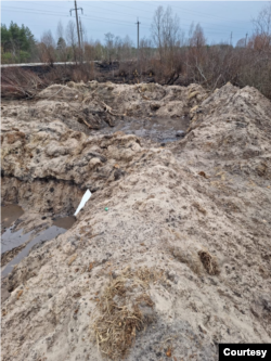 Trenches that Ukraine says Russian troops dug in radioactive soil near the Chernobyl nuclear power plant, damaged in a 1986 disaster, during a five-week occupation in February and March 2022. Photo taken on April 5, 2022. (Courtesy Evgen Kramarenko)