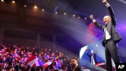FILE - French far-right presidential candidate Eric Zemmour arrives on stage during a campaign rally in Toulon, southern France, Sunday, March 6, 2022.